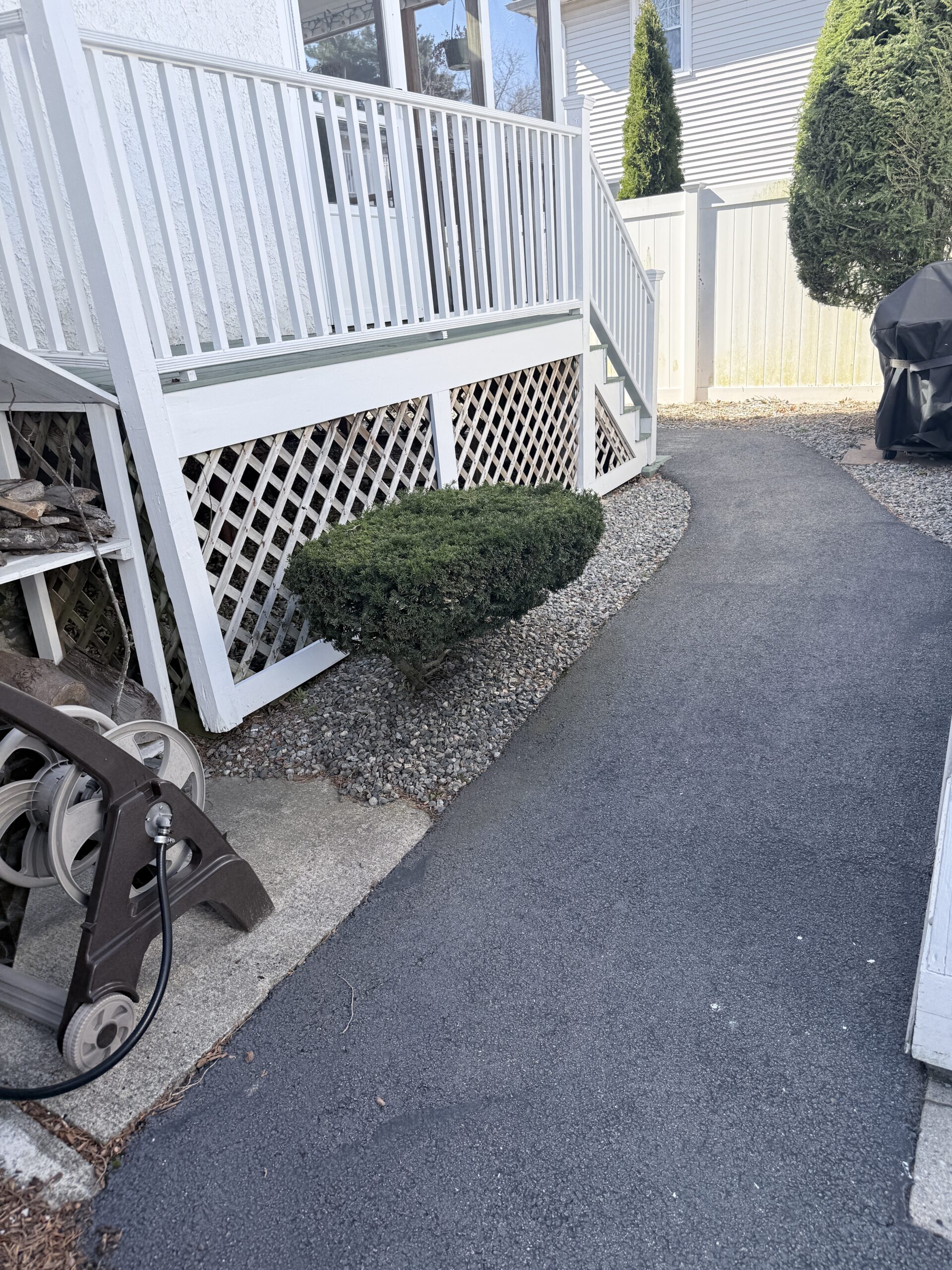 Safe low-pressure walkway cleaning to remove algae and grime in Arlington, MA.